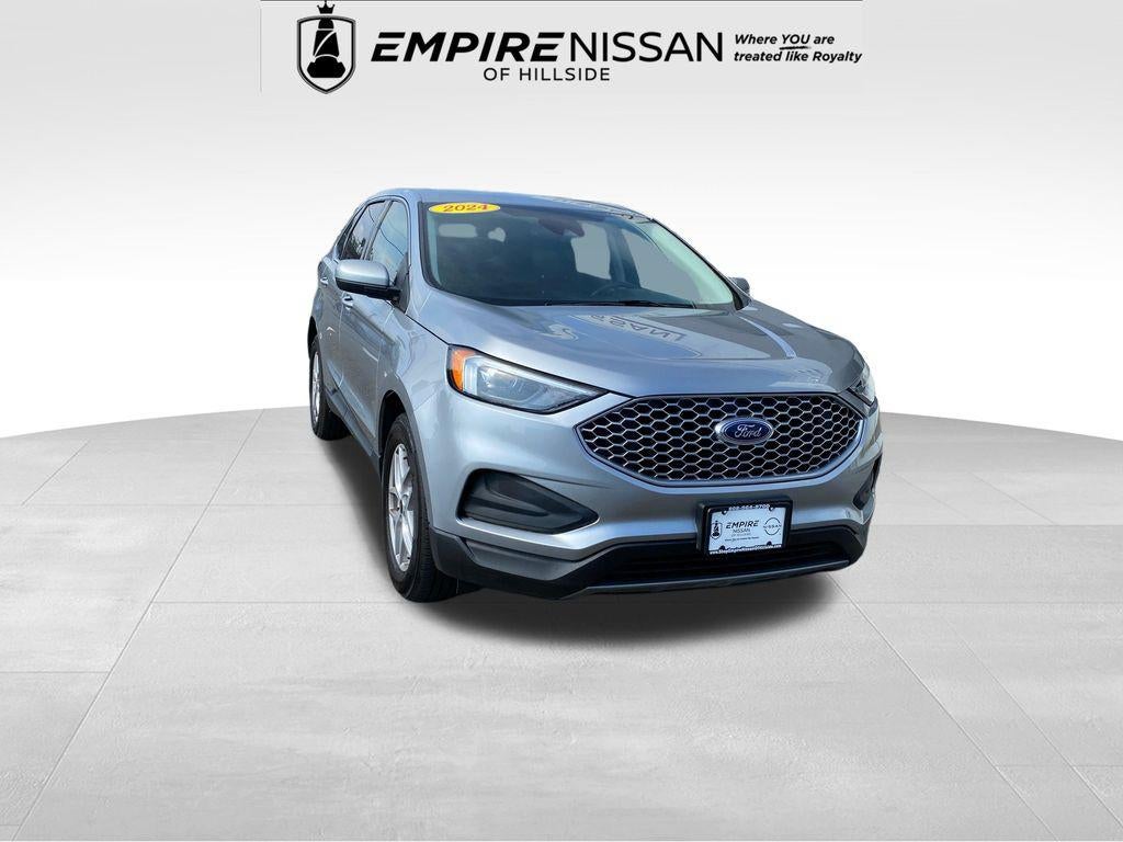 2024 Ford Edge SEL in Silver Metallic — front three-quarter view