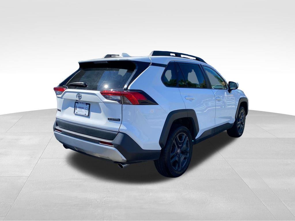 2024 Toyota RAV4 — rear three-quarter view