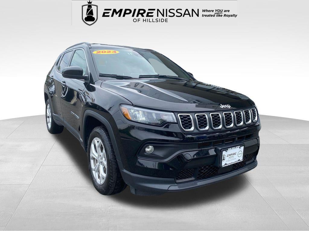 2024 Jeep Compass Latitude 4x4 in Diamond Black Crystal Pearlcoat — front three-quarter view