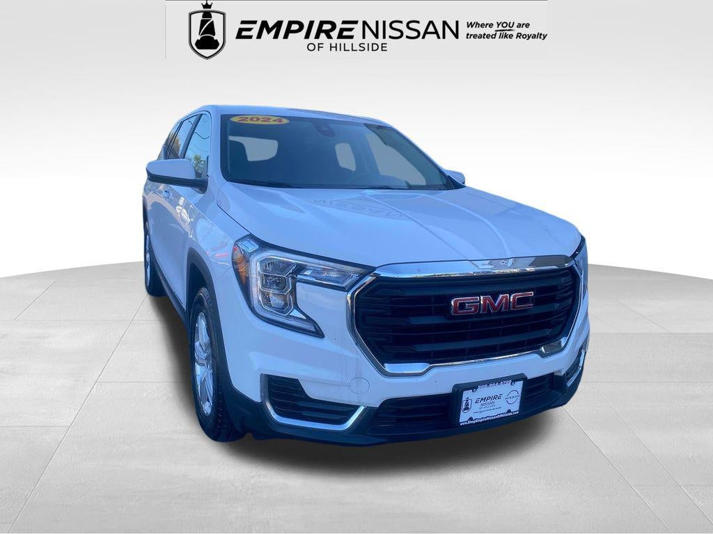 2024 GMC Terrain AWD SLE in Summit White — front three-quarter view