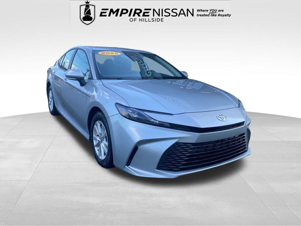 2025 Toyota Camry LE in Celestial Silver Metallic — front three-quarter view