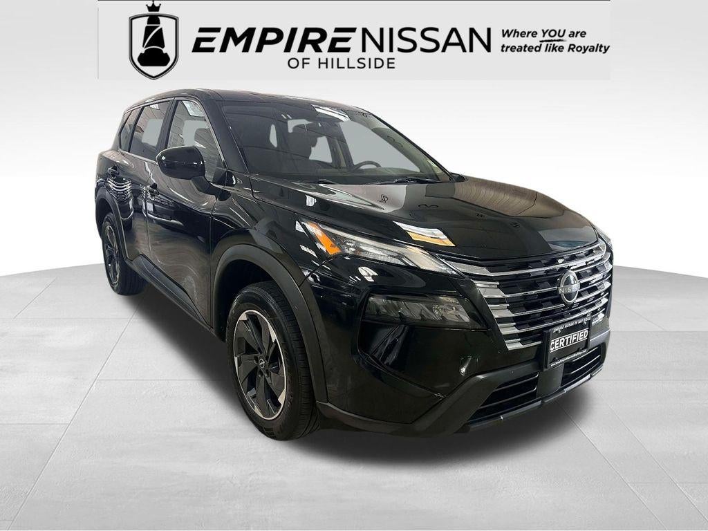 2024 Nissan Rogue SV FWD in Super Black — front three-quarter view