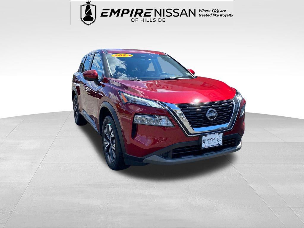2023 Nissan Rogue SV Intelligent AWD in Scarlet Ember Tintcoat — front three-quarter view