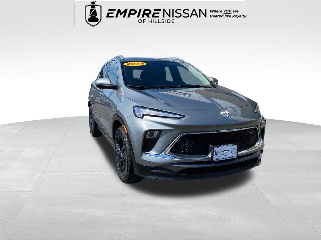 2024 Buick Encore GX Sport Touring AWD in Moonstone Gray Metallic — front three-quarter view