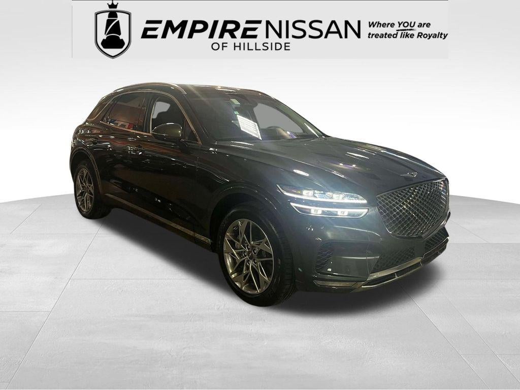 2025 Genesis GV70 2.5T AWD in Storr Green — front three-quarter view